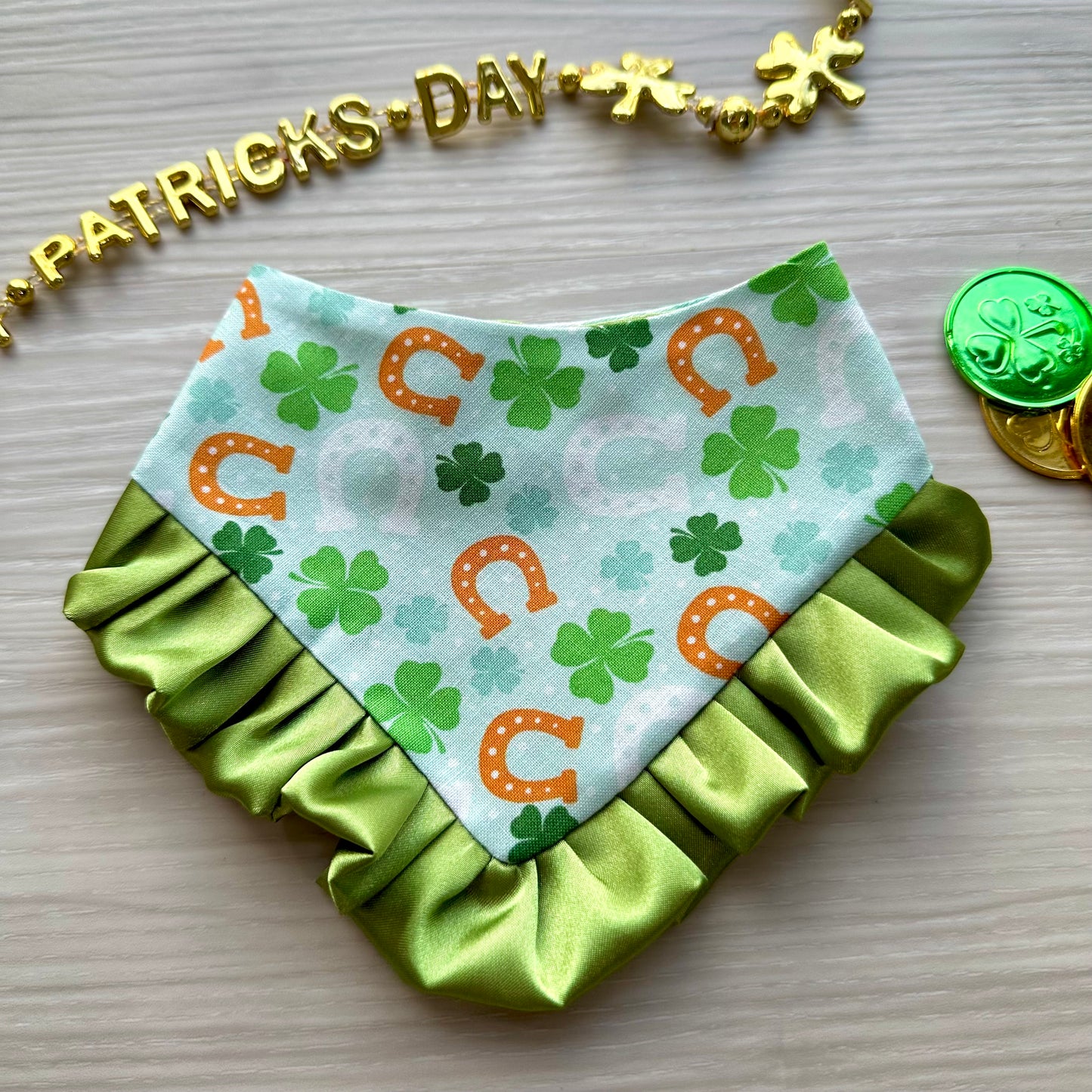 St. Patricks Dog bandana with ruffles, lucky horseshoe orange